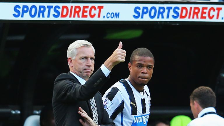 NEWCASTLE UPON TYNE, ENGLAND - AUGUST 31:  Newcastle United manager Alan Pardew signals as Loic Remy prepares to come on during the Barclays Premier League