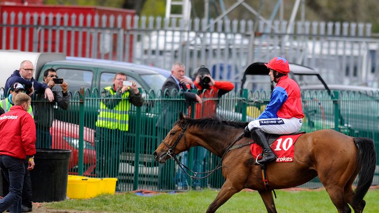 Ruby Walsh riding Quevega make a lonely walk back after finishing second in The Ladbrokes World Series Hurdle at Punchestown