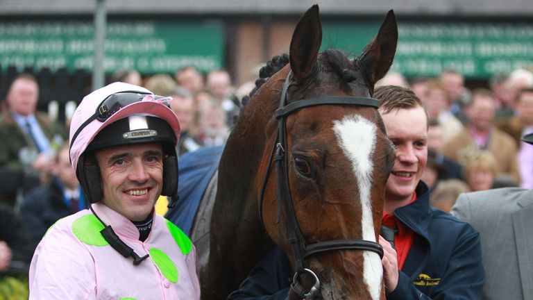 Ruby Walsh celebrates winning The Tattersalls Ireland Champion Novice Hurdle on Vautour during day four of the Punchestown Festival at Punchestown