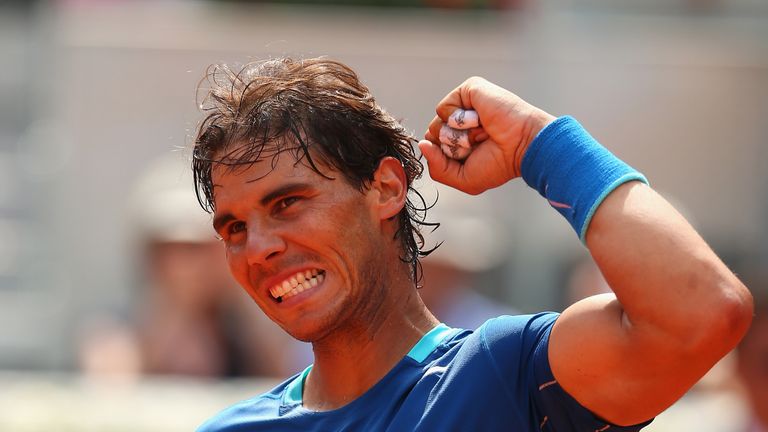 Rafael Nadal of Spain celebrates his straight sets victory against Jarkko Nieminen of Finland in their third round of the Madrid Open