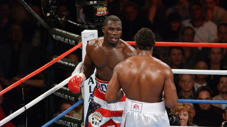 Hasim Rahman is forced against the ropes by Lennox Lewis during their WBC/IBF World Heavyweight Championship fight
