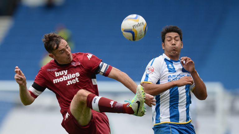 BRIGHTON, ENGLAND - AUGUST 10:  Richard Keogh of Derby is challenged by Leonardo Ulloa of Brighton during the Sky Bet Championship match between Brighton &