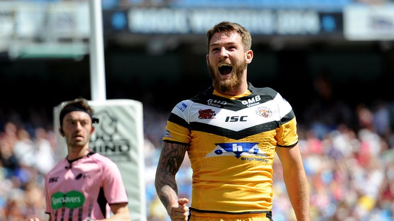 Castleford Tigers' Daryl Clark celebrates after scoring a try
