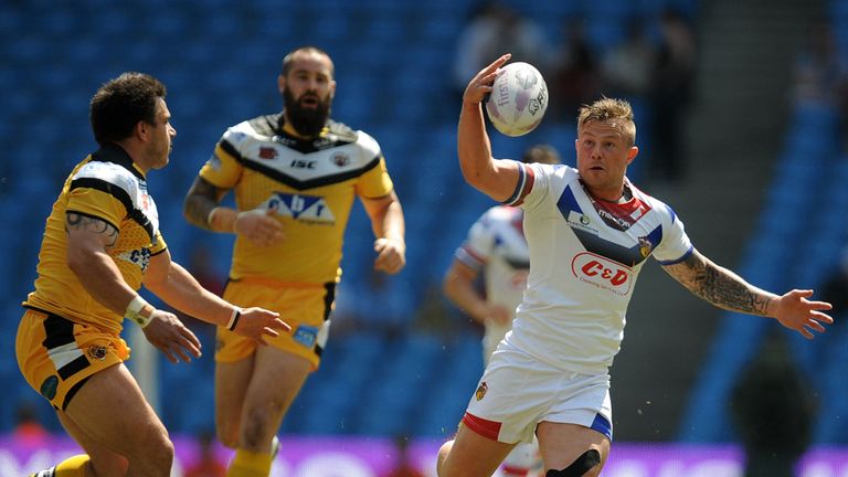 Wakefield Wildcats' Harry Siejka runs at the Castleford Tigers defence during the First Utility Super League Magic Weekend match at the Etihad Stadium, Man