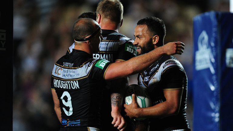 Hull FC's Aaron Heremaia (right) is congratulated by Danny Houghton after scoring a try during the Super League match at the KC Stadium, Hull.