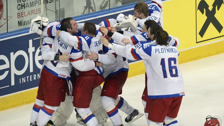 Russia's players celebrate their 5-2 victory in the world championship final