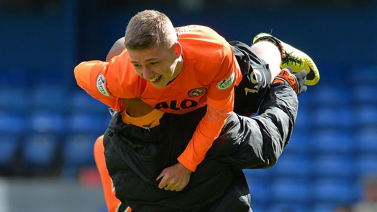 GLASGOW, SCOTLAND - APRIL 12 : Ryan Gauld of Dundee United is carried from the pitch as the Dundee United players celebrate during the William Hill Scottis