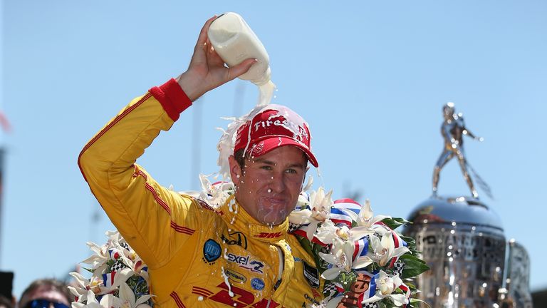 Ryan Hunter-Reay, driver of the #28 DHL Andretti Autosport Honda Dallara, celebrates after winning the Indianapolis 500