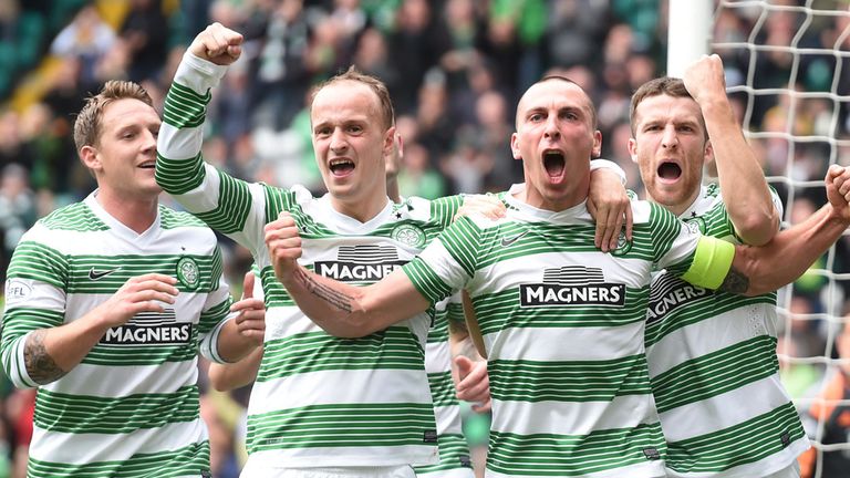 Scott Brown is mobbed by his team mates after giving Celtic a 2-1 lead against Aberdeen