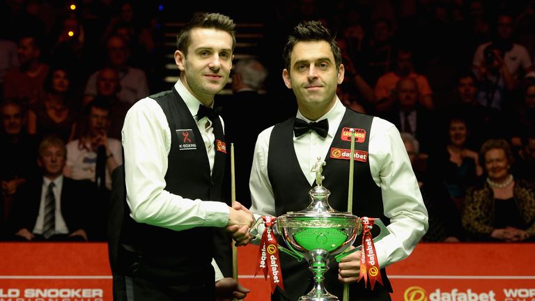 Mark Selby and Ronnie O'Sullivan shake hands ahead of the World Snooker Championship final at the Crucible