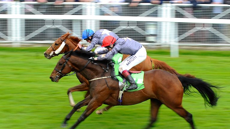 Ryan Moore riding Suegioo (L) win The Stanjames.com Chester Cup from Angel Gabrial