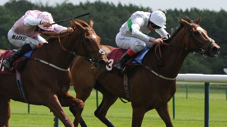 Sultanina ridden by William Buick (left) beats Freedom's Light at Haydock
