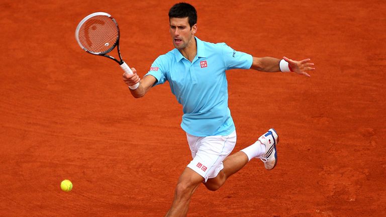 PARIS, FRANCE - MAY 26:  Novak Djokovic of Serbia returns a shot during his men's singles match against Joao Sousa of Portugal on day two of the French Ope