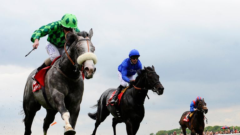 YORK, ENGLAND - MAY 15:  Ryan Moore riding The Grey Gatsby (L) win The Betfred Dante Stakes at York racecourse on May 15, 2014 in York, England. (Photo by 