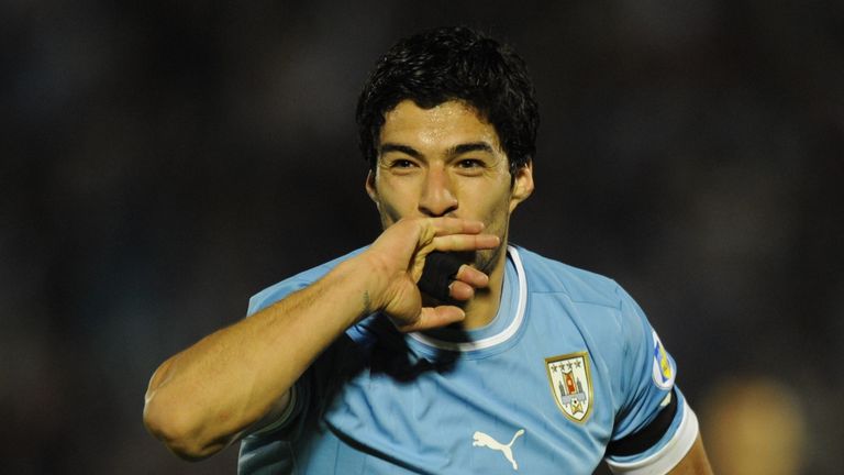 Uruguayan forward Luis Suarez celebrates after scoring against Paraguay during their FIFA World Cup Brazil 2014 South American qualifying football match in