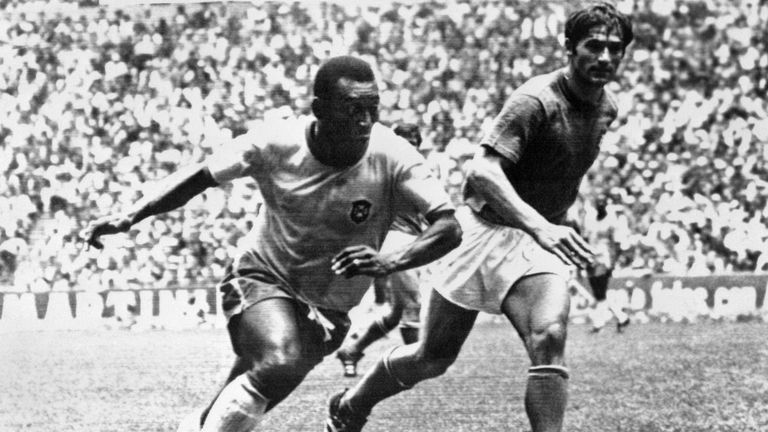 Brazilian midfielder Pelé (L) dribbles past Italian defender Tarcisio Burgnich during the World Cup final on 21 June 1970 in Mexico City. Pelé scored the