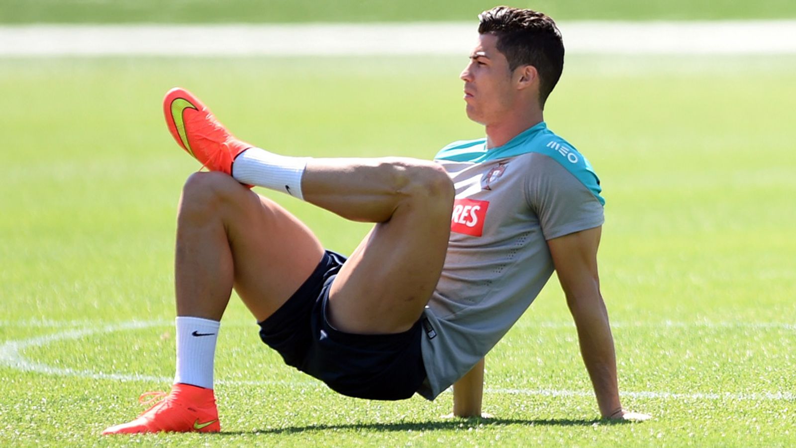 Cristiano Ronaldo: Limbers up before training in New Jersey on Saturday.