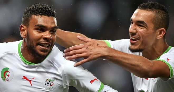 Nabil Bentaleb and El Arabi Soudani: Celebrate after scoring against Romania