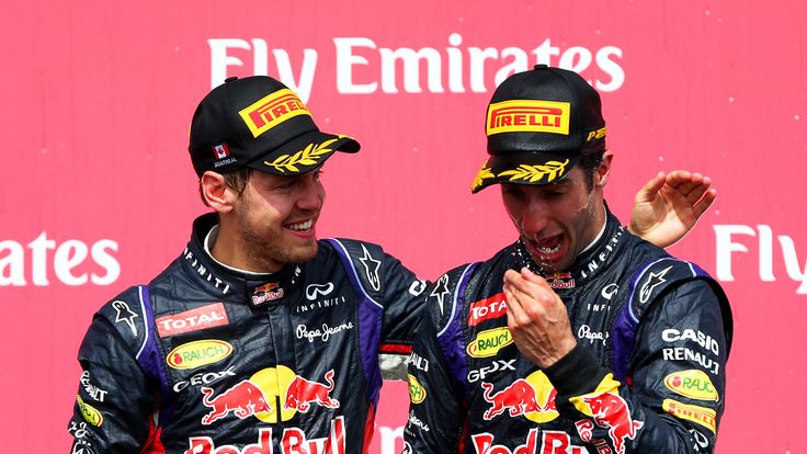 Daniel Ricciardo of Australia and Sebastian Vettel on the podium