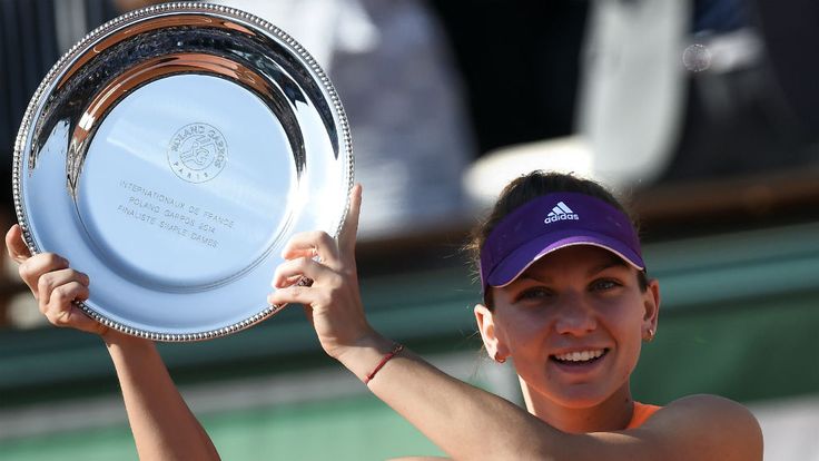 Romania's Simona Halep holds the runner up trophy after losing the French tennis Open final