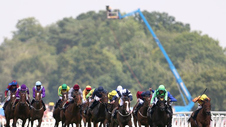 The field begin to bear down upon the final furlong in the Albany Stakes