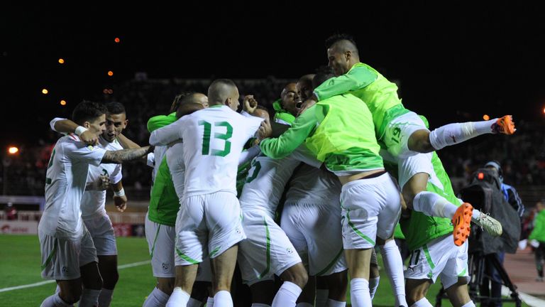 Algeria celebrate victory over Burkina Faso in their World Cup qualifying match