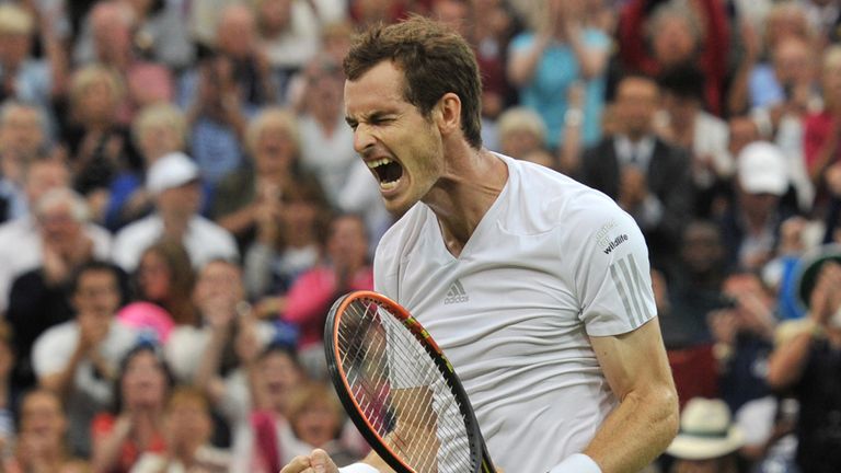 Andy Murray celebrates victory over Kevin Anderson in the fourth round of Wimbledon