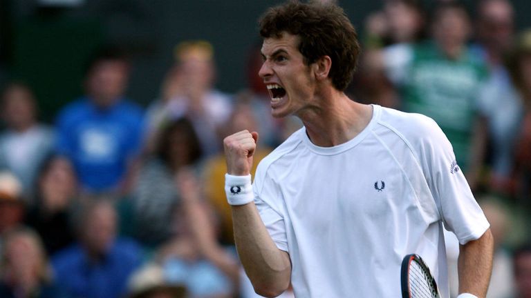 Andy Murray celebrates winning the third set during the men's singles round four match against Richard Gasquet at Wimbledon 2008