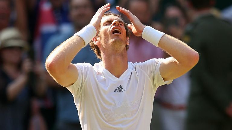 Andy Murray reacts following his victory in the Gentlemen's Singles Final match against Novak Djokovic of Serbia at Wimbledon 2013