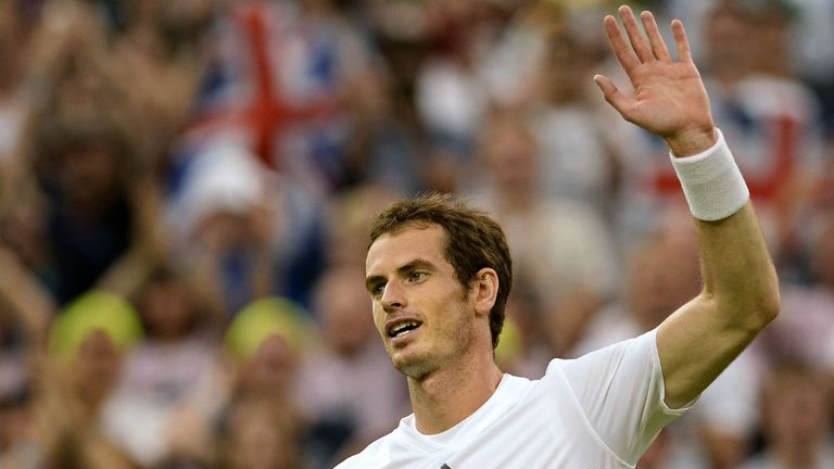 Andy Murray celebrates victory during his Gentlemen's Singles third round match against Tommy Robredo