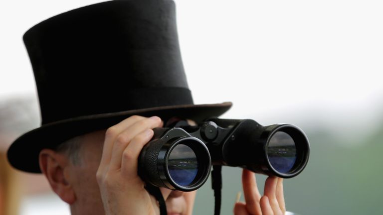A racegoer surveys the track ahead of another exciting day of racing
