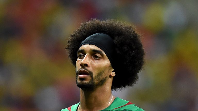 Cameroon's defender Benoit Assou-Ekotto walks on the pitch during the Group A football match between Cameroon and Croatia at The Amazonia Arena in Manaus 