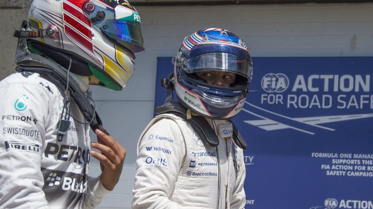 Valtteri Bottas (R) starts directly behind Lewis Hamilton on the grid
