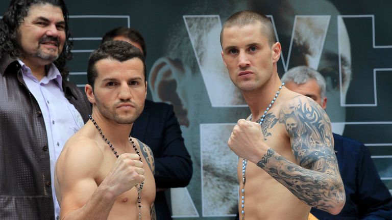 FORMER WORLD CHAMPION RICKY BURNS WEIGHS IN WITH OPPONENT DEJAN ZLATICANIN. BRAEHEAD CENTRE,GLASGOW. PIC LAWRENCE LUSTIG.