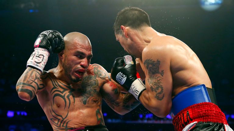 Miguel Cotto of Puerto Rico battles Sergio Martinez of Argentina during their WBC Middleweight championship fight in New York