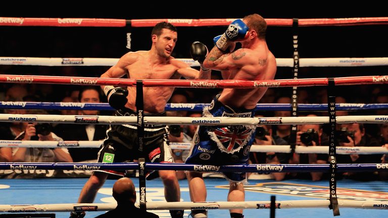 Carl Froch and George Groves in action during the  IBF & WBA World Super Middleweight Title Fight
