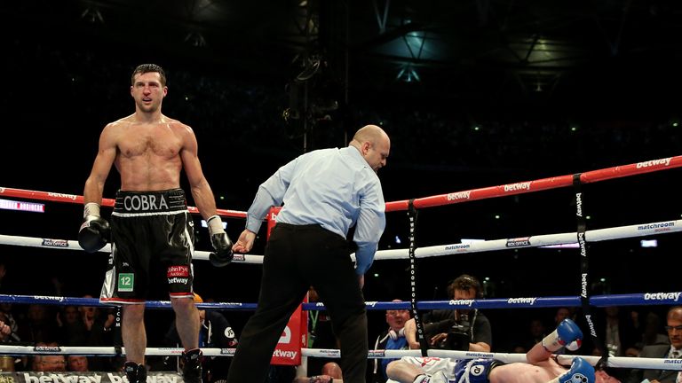 George Groves is kncoked down by Carl Froch in their IBF and WBA World Super Middleweight fight
