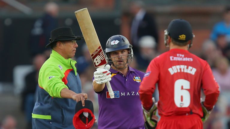 MANCHESTER, ENGLAND - JUNE 06: Aaron Finch of Yorkshire Vikings celebrates reaching 50 at Old Trafford on June 6, 2014 in Manchester, England. (Photo by Da