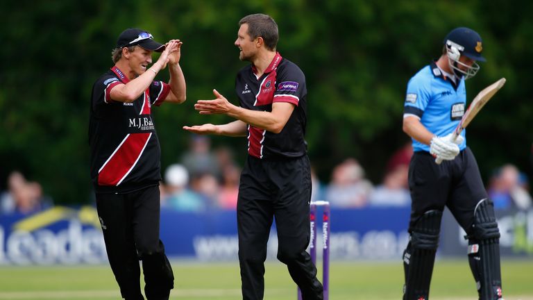 ARUNDEL, ENGLAND - JUNE 15: Dirk Nannes of Somerset (C) celebrates with teammate Max Waller after dismissing Chris Nash of Sussex (R) during the Natwest T2