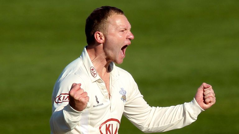 Gareth Batty of Surrey celebrates after taking the wicket of John Simpson of Middlesex during the LV County Championship match 2013