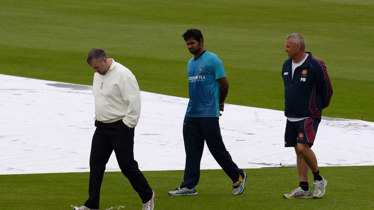 Umpire Paul Pollard (left) and Sri Lanka's Lahiru Thirimanne (centre) at Wantage Road, Northampton. Jun 7 2014.