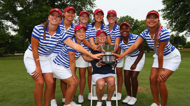 United States team captain Ellen Port poses for a photograph with her team and the Curtis Cup trophy