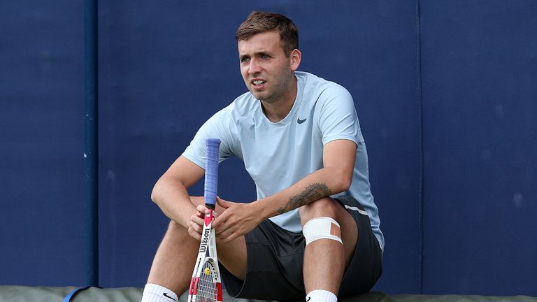 LONDON, ENGLAND - JUNE 07:  Dan Evans of Great Britain rests during a practice session ahead of the AEGON Championships at Queens Club on June 7, 2014 in L