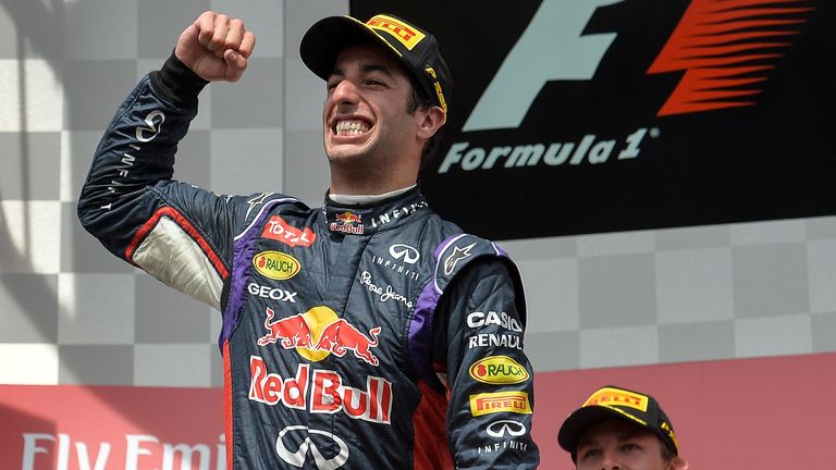 Daniel Ricciardo celebrates on the podium