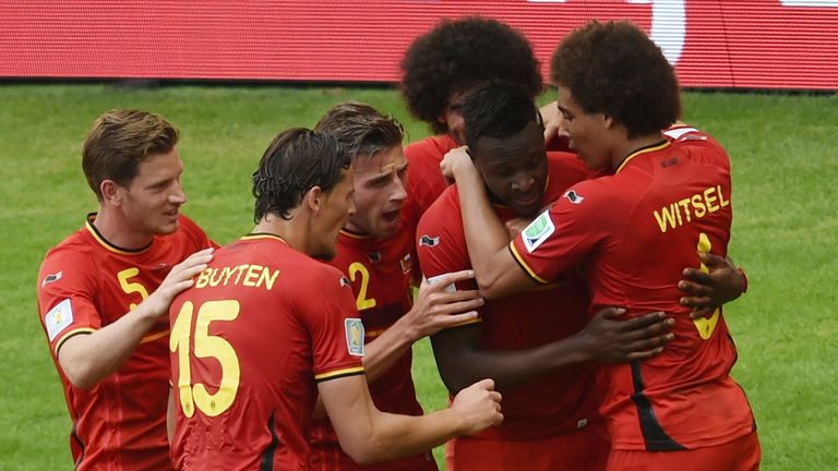 Belgium's forward Divock Origi (2nd R) celebrastes his goal against Russia with teammates during a Group H football match between at the Maracana Stadium