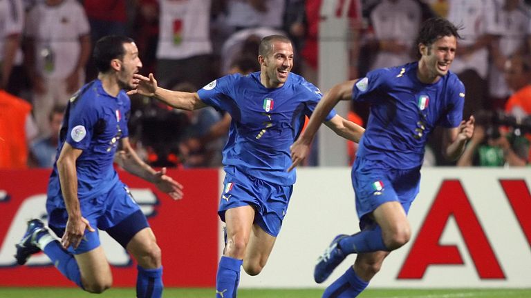 Italian defender Fabio Grosso (R) celebrates his goal in extra time with Italian forward Alessandro Del Piero 