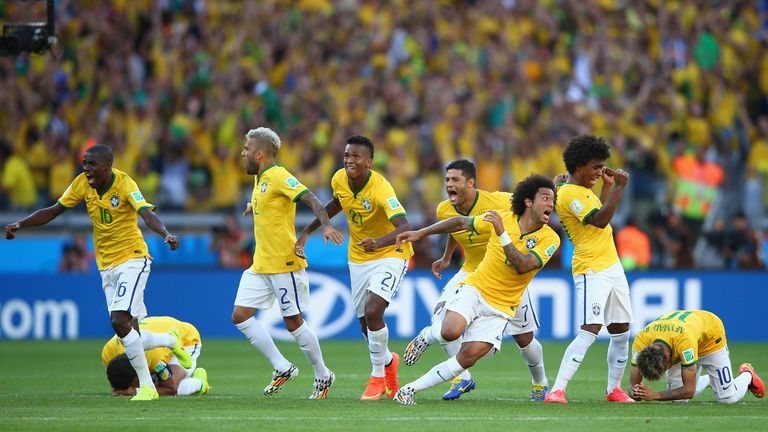 BELO HORIZONTE, BRAZIL - JUNE 28: Brazil celebrate after defeating Chile in a penalty shootout during the 2014 FIFA World Cup Brazil round of 16 match