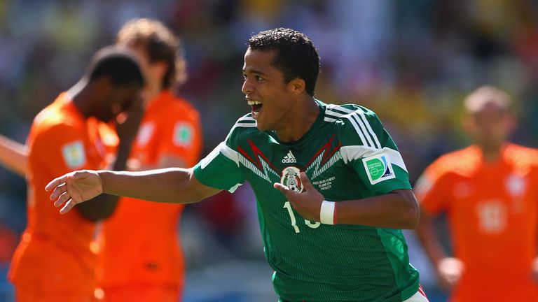 Mexico's Giovani dos Santos of Mexico celebrates his goal during the World Cup last-16 clash v Netherlands in Fortaleza