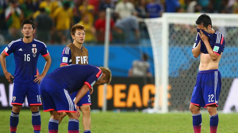 CUIABA, BRAZIL - JUNE 24:  Maya Yoshida of Japan (R) reacts after the 2014 FIFA World Cup Brazil Group C match between Japan and Colombia in Cuiaba