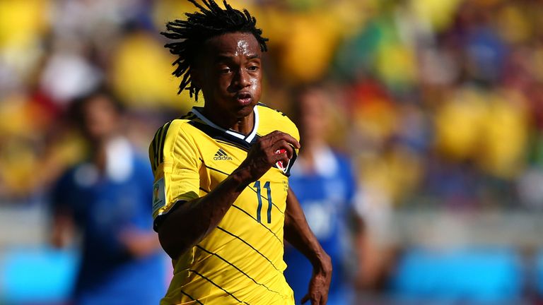 BELO HORIZONTE, BRAZIL - JUNE 14:  Juan Guillermo Cuadrado of Colombia controls the ball during the 2014 FIFA World Cup Brazil Group C match between Colomb